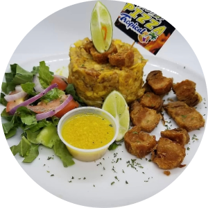 Mofongo de Chicharron — Mashed green plantains mixed with crispy pork chicharrón, garlic, and seasonings for a bold, satisfying dish.